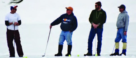 PERFECTING FORM - Nick Hixon, Kenny Bentler, Brett Davidson and Chad Gore perfect their stance on the ice golf course. photo credit Kim Cameron