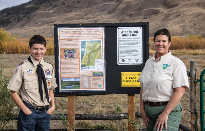 Morgan McGuire stands next to the completed fishing access site near the Colorado River along Highway 9. He is pictured with Maribeth Pecotte of the Bureau of Land Management (BLM). BLM is the beneficiary of the project.