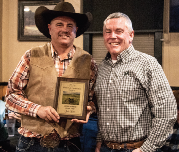 Jodi Hill of Kremmling was named Conservationist of the Year by the Middle Park Soil Conservation District. Jodi's work to provide high protein forage for wildlife and updating and improving his irrigation systems was applauded by the MPSC Board of Directors. He stands with Mark Volt of the Natural Resources Conservation Services. 