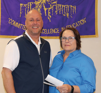 Rhea  Gallagher, of the Gore Range Artisan, presented over $800 to the West Grand School District for the art program. The money was originally collected for a scholarship fund for future artisans before the Gore Range Artisans disbanded. Representing the school district, was Superintendent Dr. Darrin Peppard. 