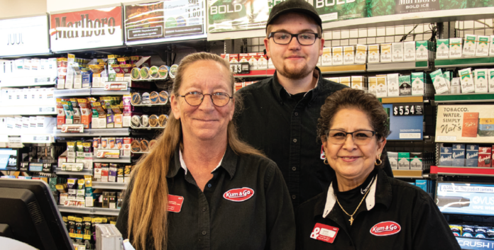 Photo by Kim Cameron | Businesses in Kremmling are carrying on under unprecedented circumstances and hand sanitizer is becoming the norm on countertops. (L to R) The Kremmling Kum & Go staff said they have had to make adjustments but are still there for customer (Lto R) Manager Kay Fuller, James Rindt and Anna Archuleta