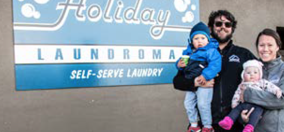 photo by Kim Cameron | Tyson Horner, the new manager of the Holiday Laundromat, poses with his wife, Chelsea, two-year-old son Jackson and five-month-old daughter Taylin. The Horners moved to Kremmling four years ago.