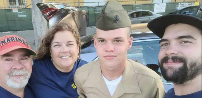 Carson Culbreath poses with his family, Frank, Carol and Bode, after he successfully completed marine boot camp and basic training.