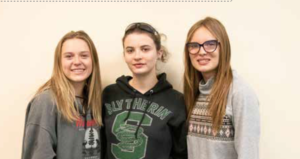 photo by Kim Cameron | The first official girls wrestling team! The three West Grand high schoolers attended the last school board meeting where the board members voted to allow the first ever West Grand girls team to compete.                    girls are coached by Shawn Lechman and Mitch Lockhart.