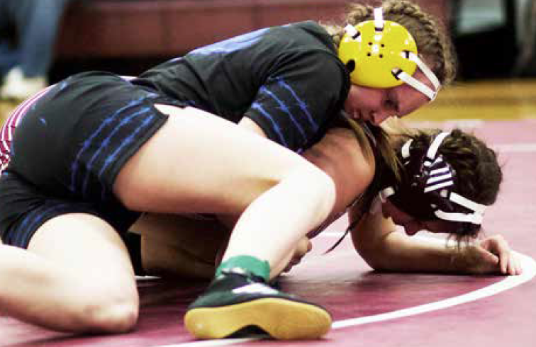 photo by Landon Williams | Sage Lechman wrestles in her first tournament.